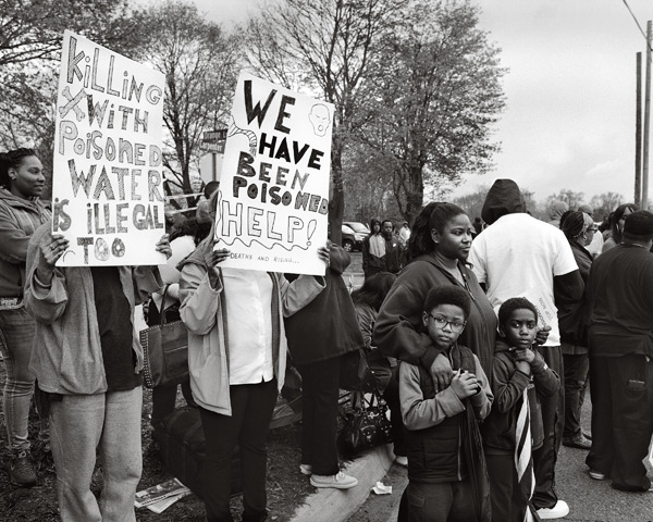 LaToya Ruby Frazier, Flint residents and students from Northwestern High School await the arrival of President Barack Obama, May 4, 2016, from the series Flint is Family Courtesy the artist, Gavin Brown's Enterprise, New York/Rome, and Michel Rein, Paris/Brussels