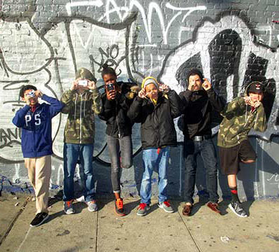 Teaching artist Chris Lopez, with his students from Grand Street Settlement Beacon Community Center.