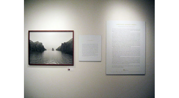 A photograph on view at Aperture gallery with descriptive wall text.