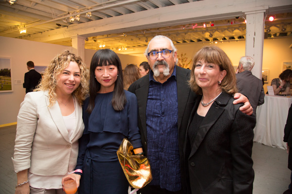 Spring Party guest with gallerist Lexing Zhang, and Aperture trustees Stuart Cooper and Rebecca Besson. Photo by Max Mikulecky