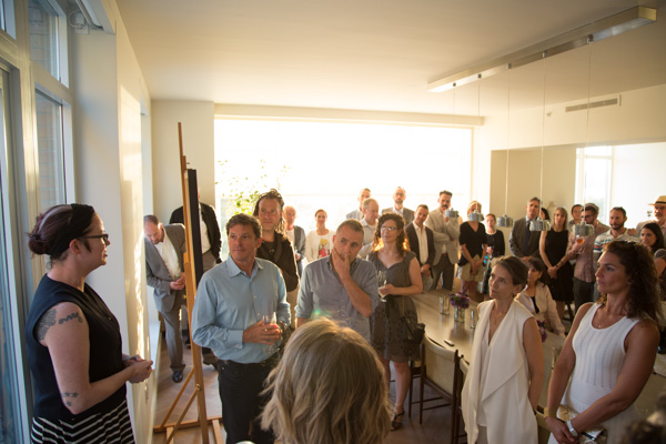 Aperture Foundation creative director and publisher Lesley A. Martin introducing photographer Matthew Pillsbury to event guests. Photo by Max Mikulecky.