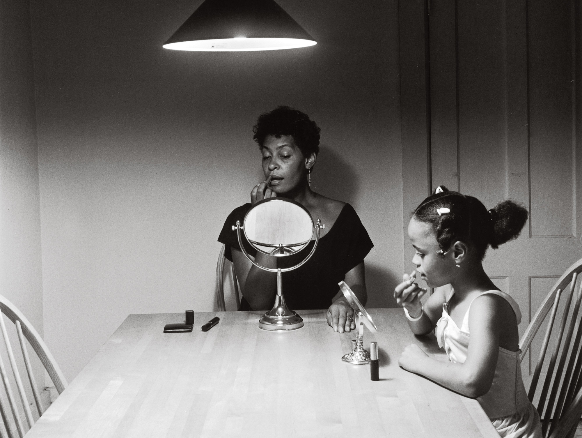 carrie mae weems woman singing from the series kitchen table