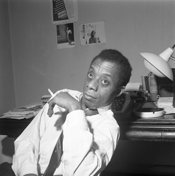 Photographer unknown, James Baldwin Sitting Smoking a Cigarette, February 5, 1963