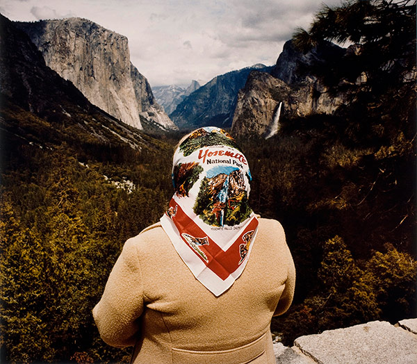 Roger Minick, Woman with Scarf at Inspiration Point, Yosemite National Park, 1980 from the series Sightseers © the artist and courtesy the George Eastman Museum