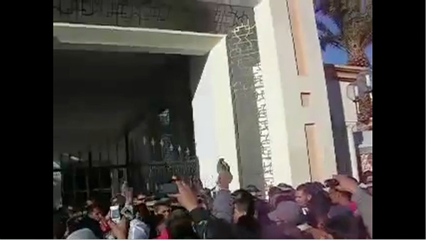 Videos recorded on mobile phones show the first protests in response to the suicide of 26-year-old Tunisian street vendor, Mohamed Bouazizi, who set himself on fire in front of a government building after his produce had been confiscated by the police. Bouazizi’s public suicide marked the beginning of the Arab Spring. Courtesy of YouTube.