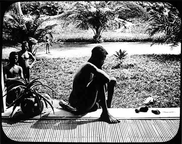 Nsala of Wala with the severed hand and foot of his five-year-old daughter, who was murdered by an ABIR (Anglo-Belgian India Rubber Company) militia, a result of King Leopold of Belgium’s brutal colonial rule, ca. 1904. Courtesy Alice Seeley Harris/Anti-Slavery International and Autograph ABP, London