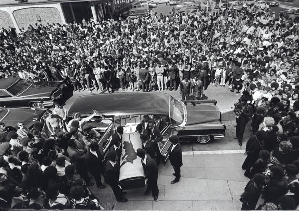 Stephen Shames, Oakland, California, USA: Black Panthers carry George Jackson's coffin into St. Augustine’s Church for his funeral service as a huge crowd watches, August 28, 1971Courtesy the artist and Steven Kasher Gallery