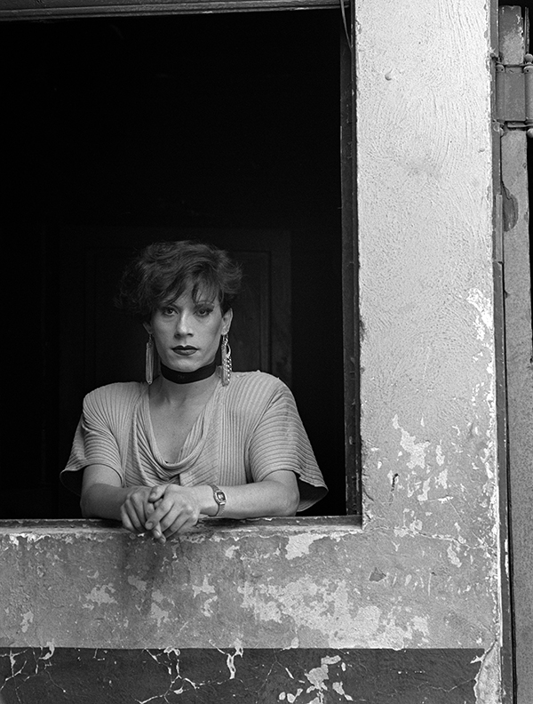 Paz Errázuriz, black and white portrait of figure in window