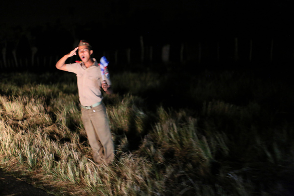 Noah Friedman-Rudovsky, A young military serviceman salutes the fallen leader's caravan, Cuba, 2016 Courtesy the artist