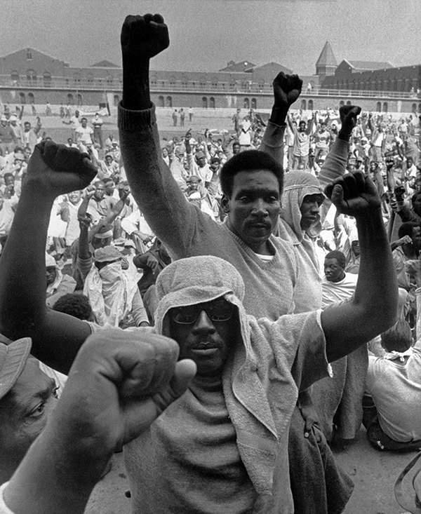 Bob Schutz, Clenched fists at Attica State Prison, Attica, New York, September 10, 1971 Courtesy the Associated Press