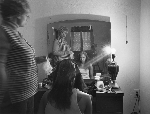 LaToya Ruby Frazier, Mom Relaxing My Hair, 2005. © LaToya Ruby Frazier