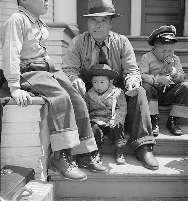 Dorothea Lange, Oakland, California, 1942. Residents of Japanese ancestry waiting for evacuation buses © The Oakland Museum of California 