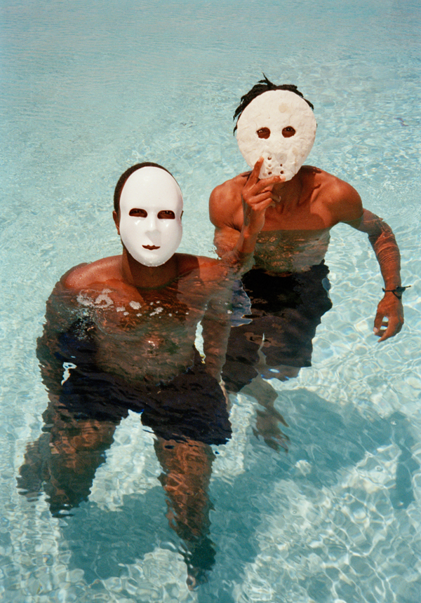 Nico Krijno, Boys in pool with masks, 2014Courtesy the artist