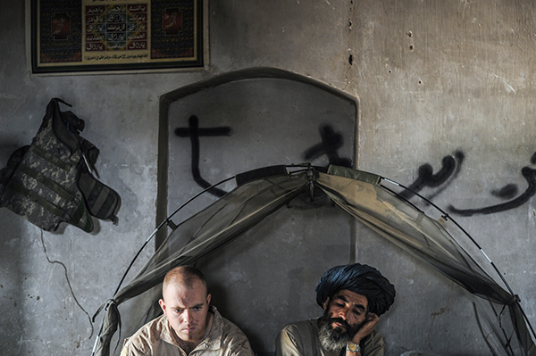 Peter van Agtmael, A Marine with a Village Elder, Helmand Province, Afghanistan, 2009 © the artist/Magnum Photos 