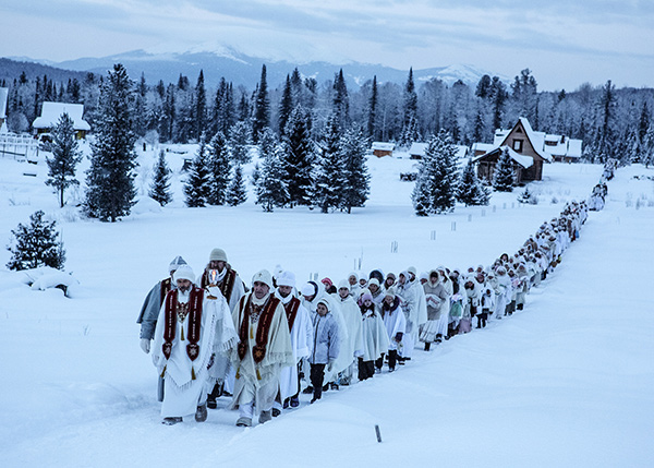 Jonas Bendiksen, On January 14, Vissarion's birthday, his disciples enter the community's innermost and holiest village, Obitel Rassveta, or The Abode of Dawn, Russia, 2015 © the artist/Magnum Photos