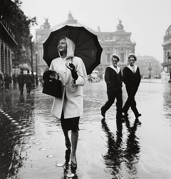 Jean Moral, Model in raincoat by Schiaparelli, Place de l’Opéra, for Harper’s Bazaar, October 1939 © Brigitte Moral, Paris 