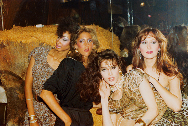 Photograph from the collection of Rosalyne Blumenstein. Four trans women, three wearing leopard print