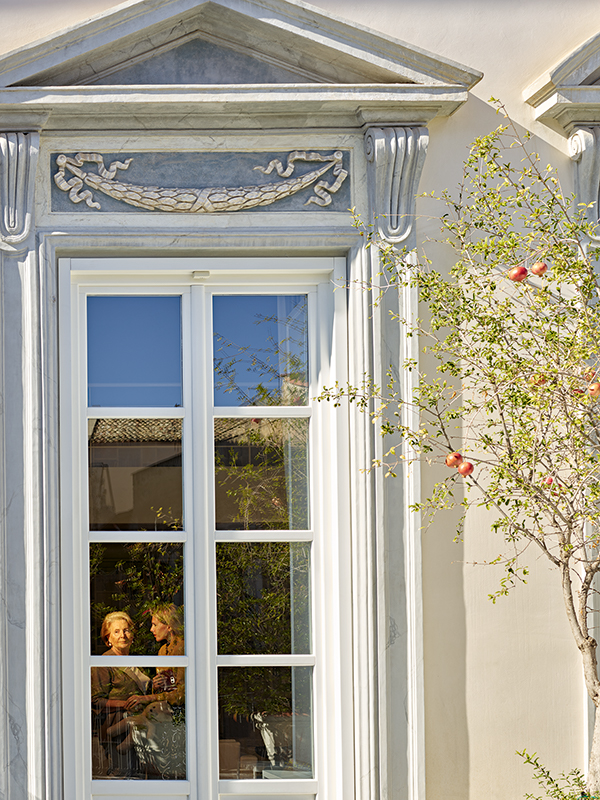 A white paned window, grandmother, green tree. Gail Albert Halaban