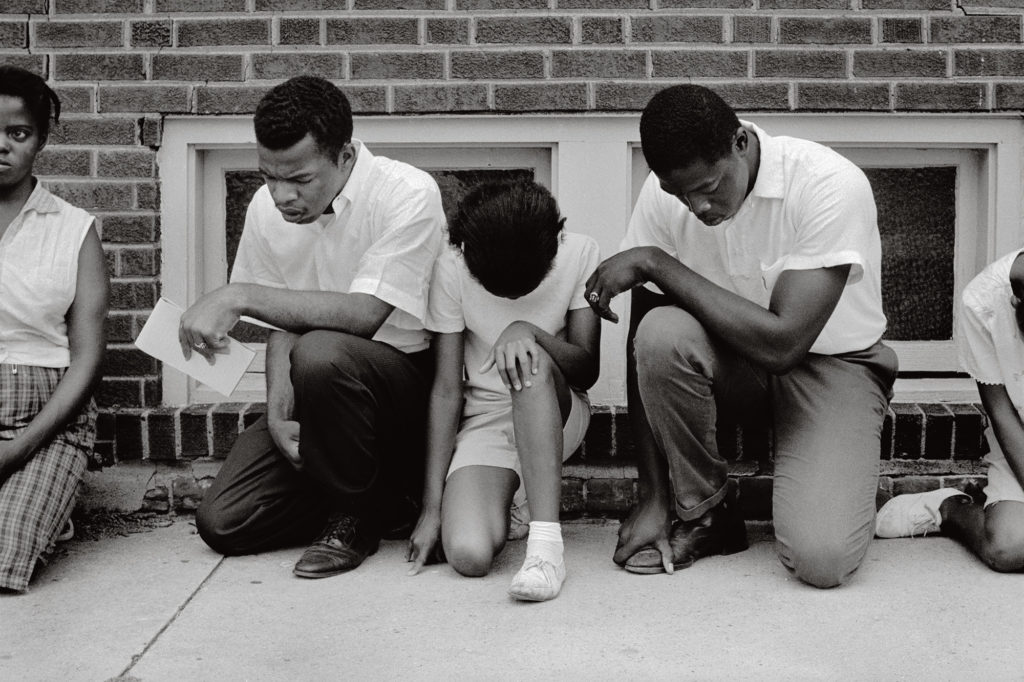 Danny Lyon, John Lewis, future chairman of the SNCC, and others demonstrate at the Cairo pool, which did not allow blacks Cairo, Illinois, 1962