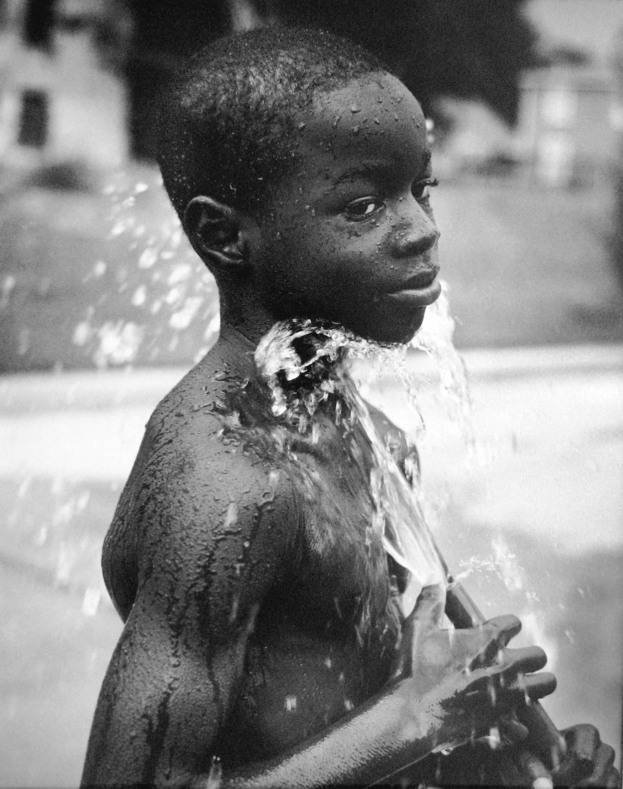 Earlie Hudnall Jr., <em>Cooling Down, 3rd Ward</em>, Houston, Texas, 1997<br>Courtesy the artist and PDNB Gallery, Dallas”>
		</div>
		<div class=