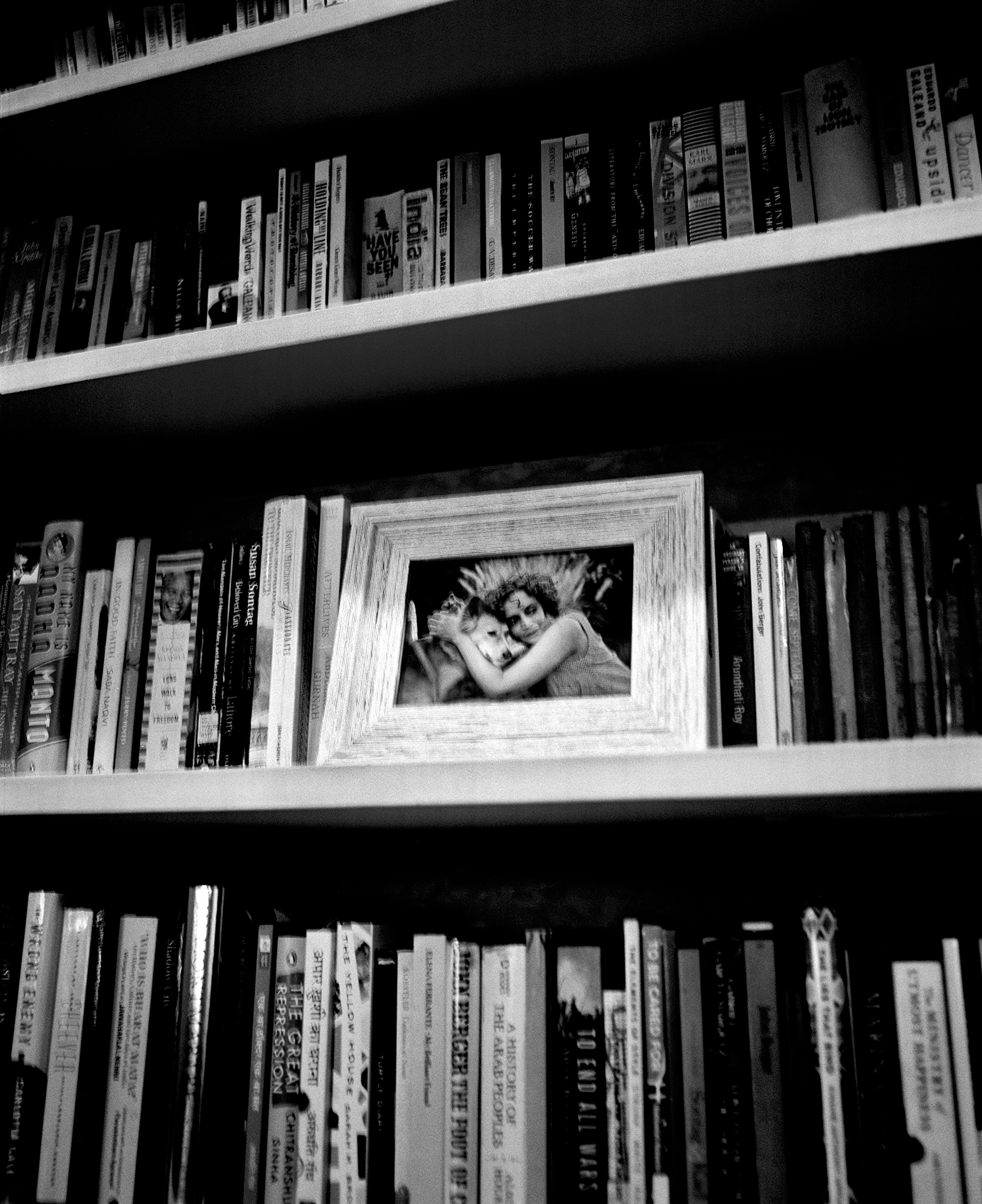 Roy's bookshelf, New Delhi, February 2021<br/>Photographs by Ashish Shah for <em>Aperture</em>“>
		</div>
		<div class=