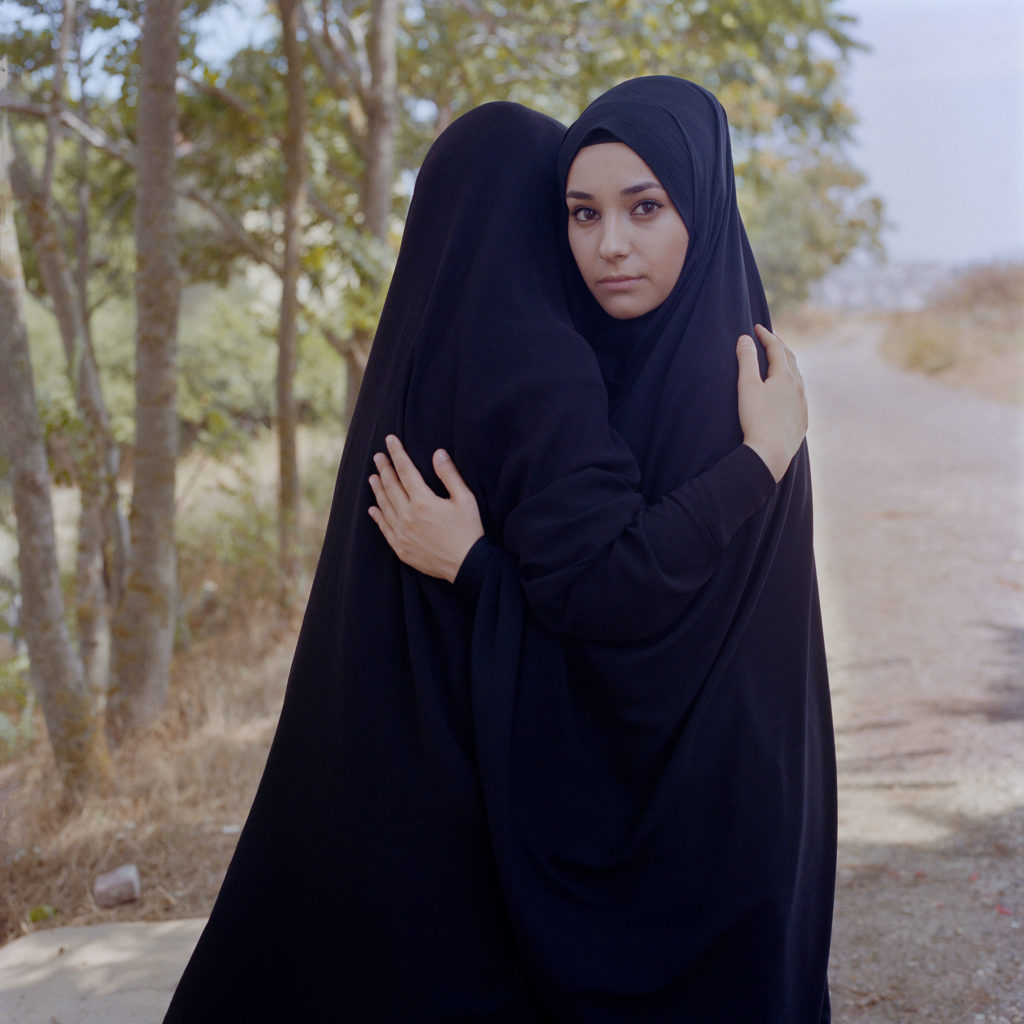 Sabiha Çimen, Nehir (18) embraces her soulmate at a picnic in Istanbul, Turkey, July 15, 2018