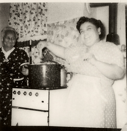 Luisa Flores and Anita Sosa López making tamales at Christmas, Dallas, ca. 1950s