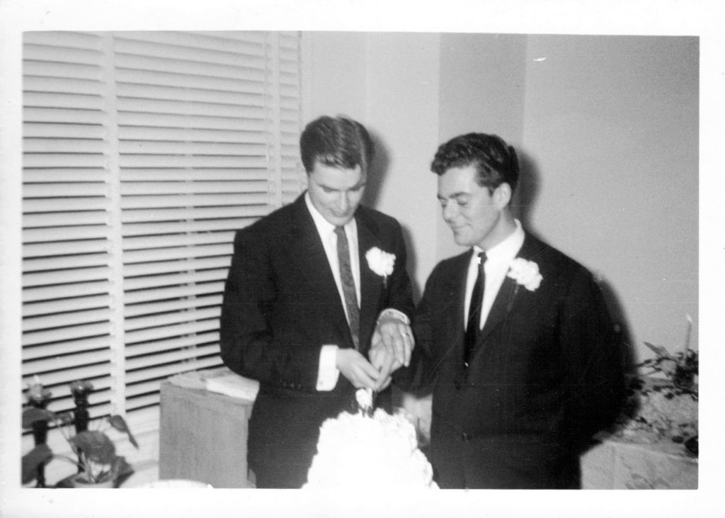 Philadelphia couple cutting their wedding cake, 1957