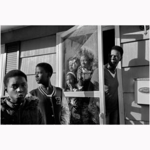Philip Montgomery, The Chatman family at home following widespread protests in the wake of the grand jury announcement against the indictment of Darren Wilson, a white police officer charged with the killing of Michael Brown, Ferguson, Missouri, November 2014; from American Mirror (Aperture, 2021).