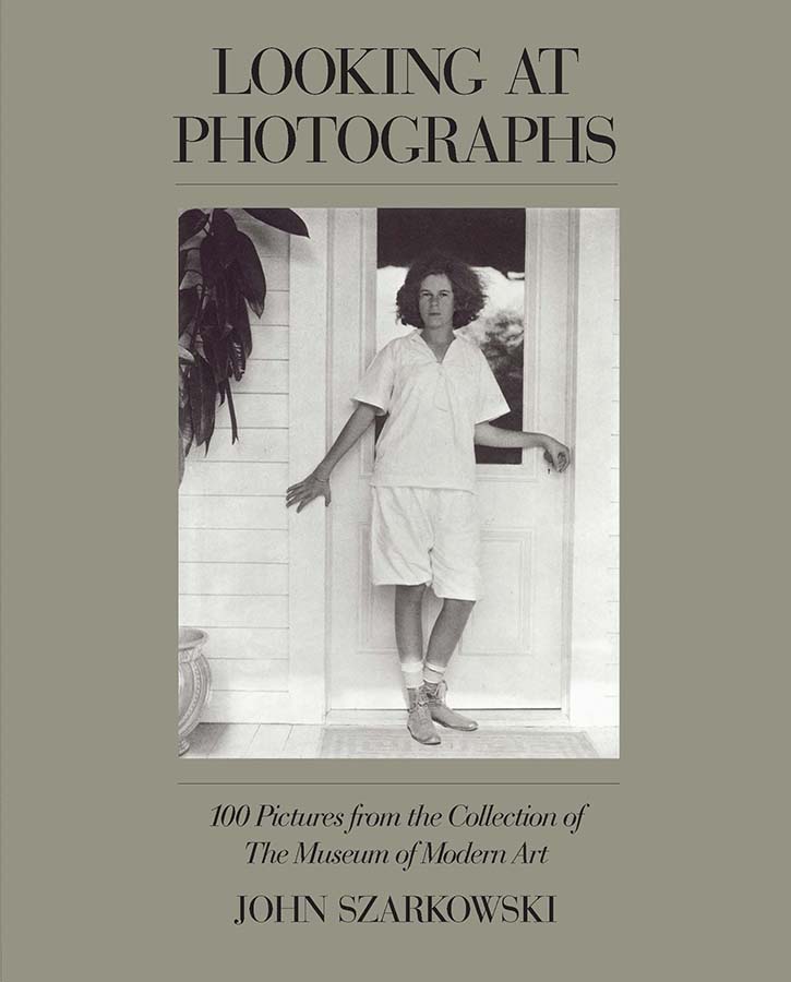 Cover of <em>Looking at Photographs</em> (Museum of Modern Art, 1973)”>
		</div>
		<div class=