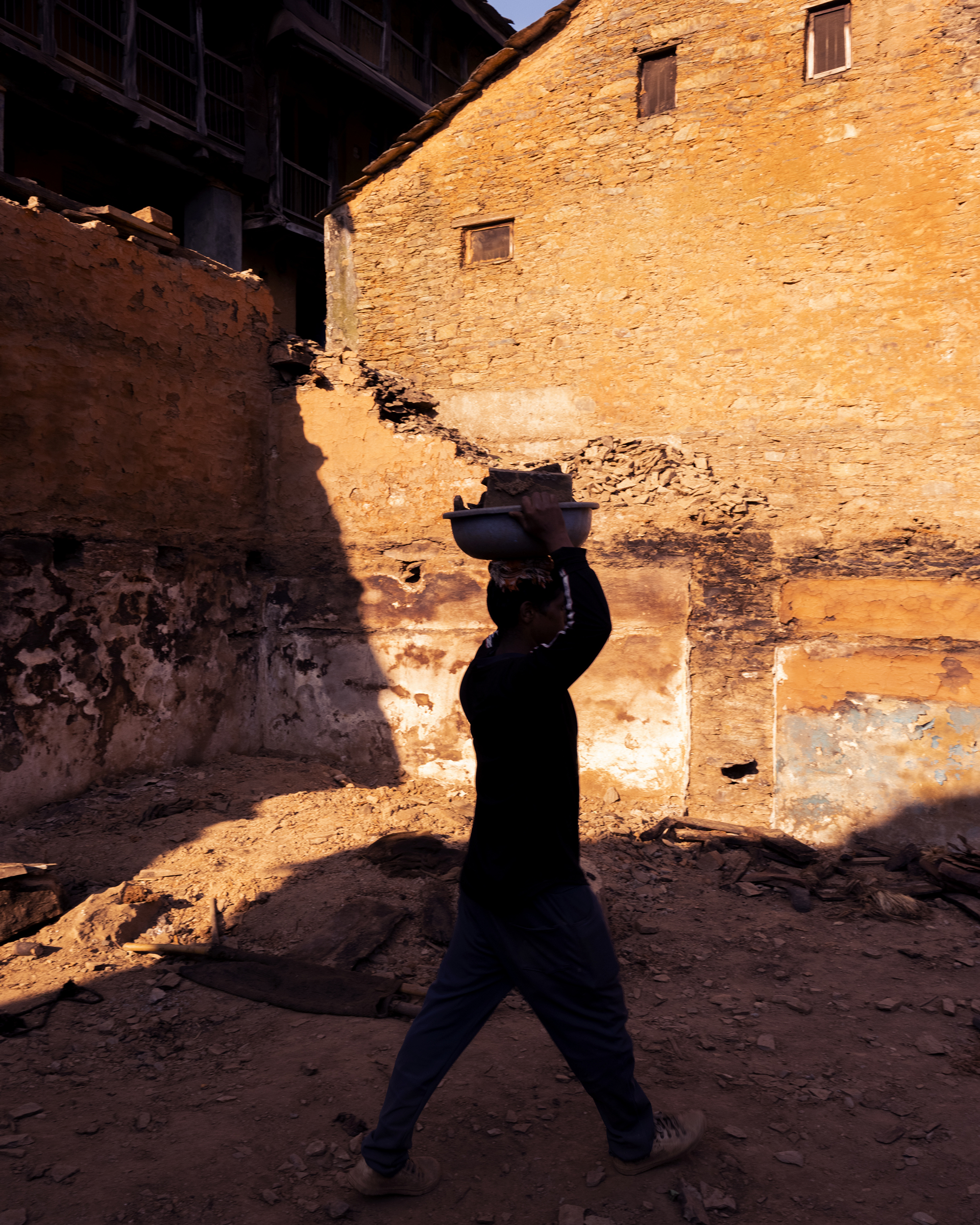 Ashish Shah, <em>A house being demolished, Amaldu Village</em>, 2022″>
		</div>
		<div class=