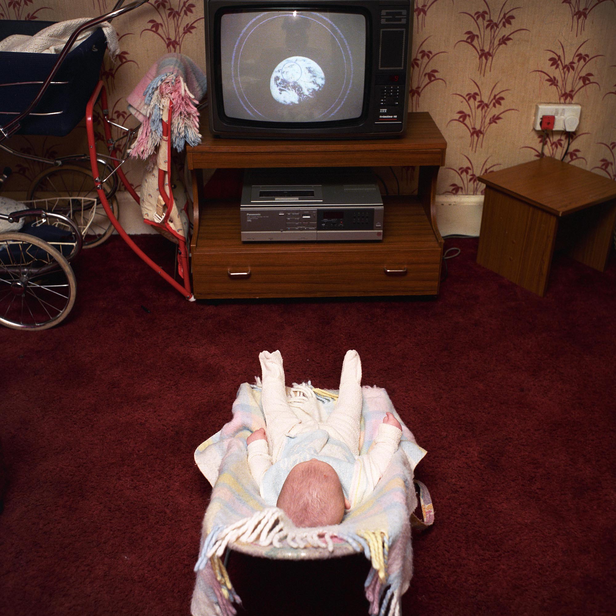 David Moore, <em>Baby, TV, Earth</em>, 1988″>
		</div>
		<div class=