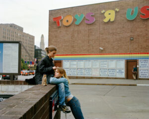 Two young women outside a Toys R Us