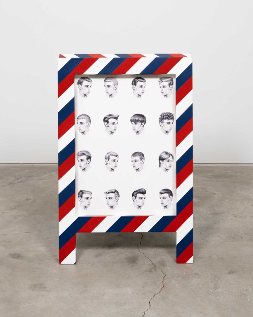 A sandwich board featuring drawings of various mens hairstyles