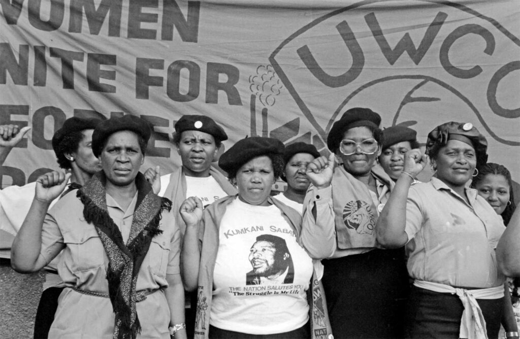 Black and white photograph of South African women at a funeral