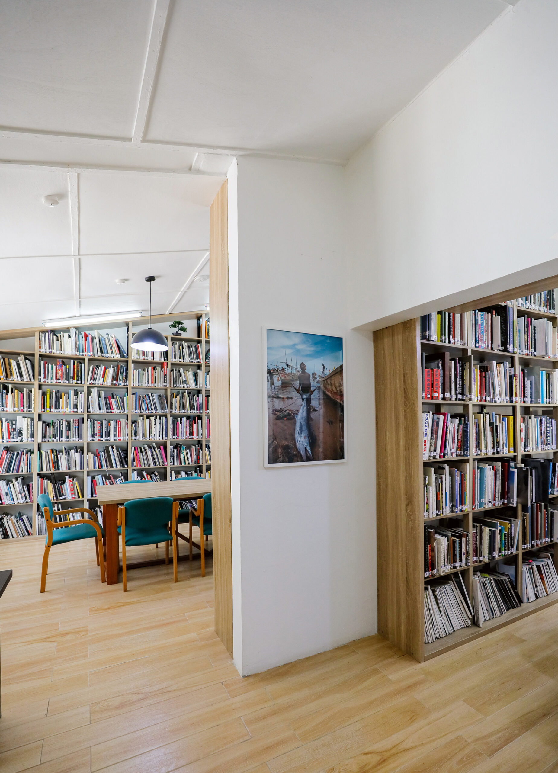 Photobooks are seen on shelves at the Dikan Centre, a library dedicated to photography, initiated by Ghanaian photographer, Paul Ninson, in Accra, Ghana. April 11, 2023. Photo: Francis Kokoroko