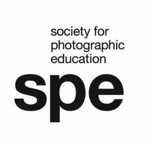 A logo for the Society for Photographic Education.