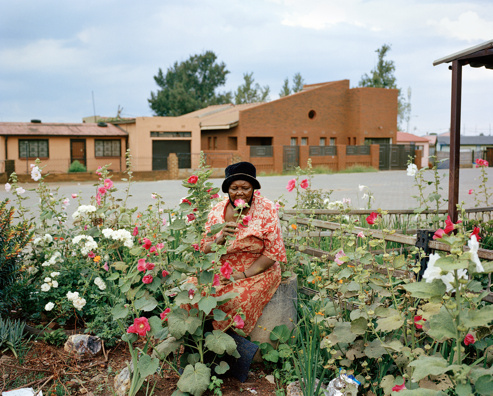 South Africa, Johannesburg, Thokoza, Gogo Lucy Zwane in her garden 2021.
