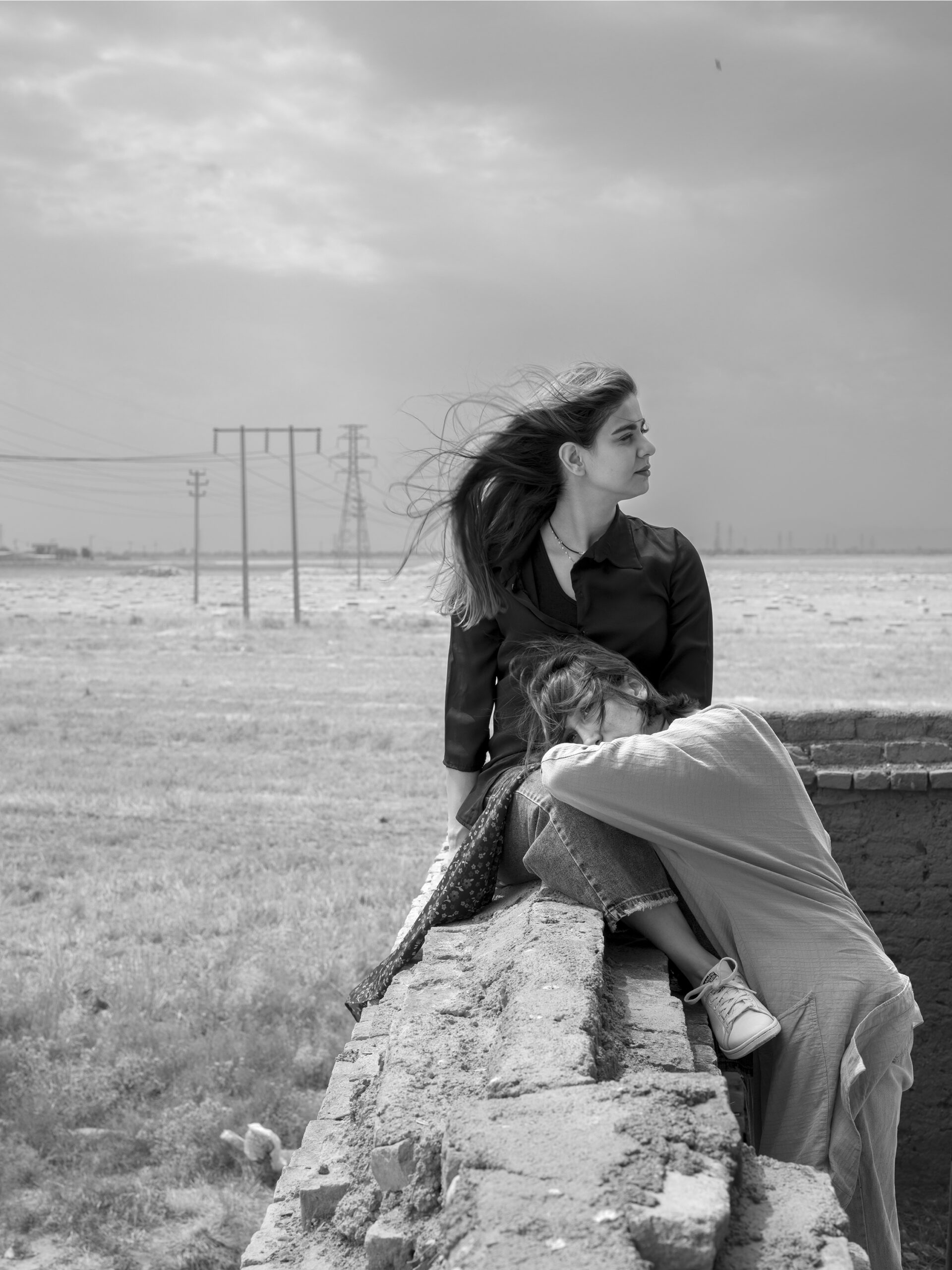 Sara Abbaspour, <em>Untitled (two girls in the landscape)</em>, 2024″>
</div>
<div class=