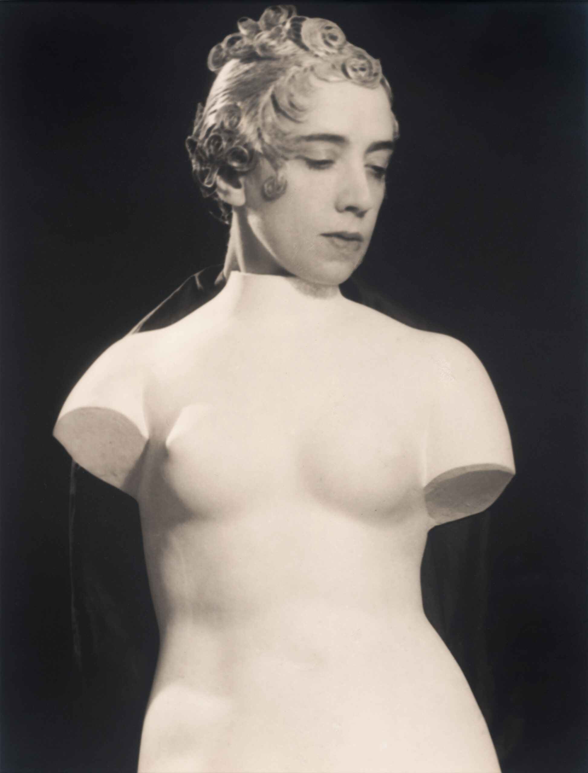 Portrait-of-Elsa-Schiaparelli-by-Man-Ray,-1933-©-2025-Man-Ray-2015-Trust.-DACS,-London.-Photo_-Collection-SFMOMA.-The-Helen-Crocker-Russell-and-William-H.-and-Ethel-W.-Crocker-Family-Funds-purchase.-