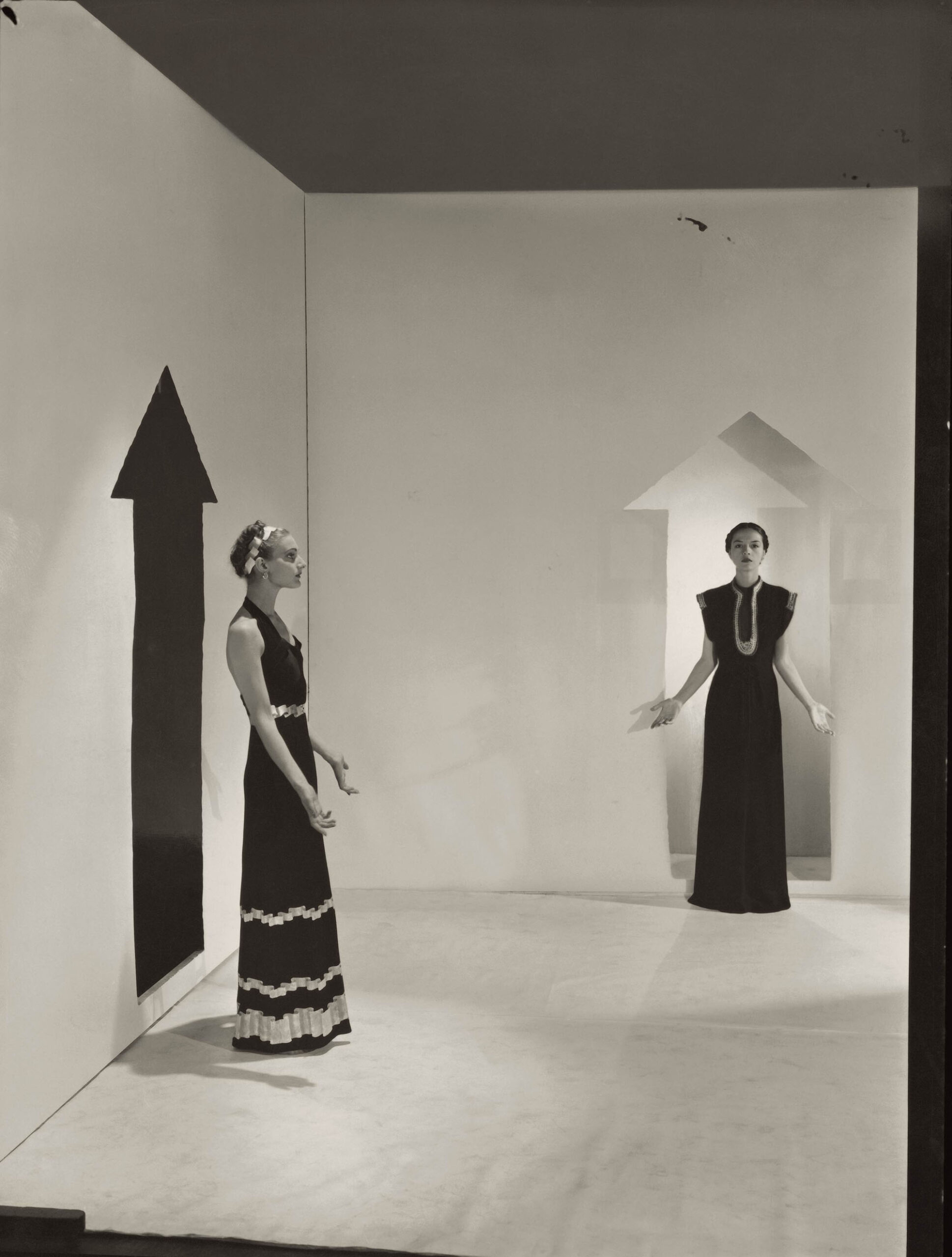 Cecil Beaton, Two models wearing dresses by Schiaparelli, <em>Vogue</em>, 1936<br>Courtesy Condé Nast via Getty Images”>
		</div>
		<div class=